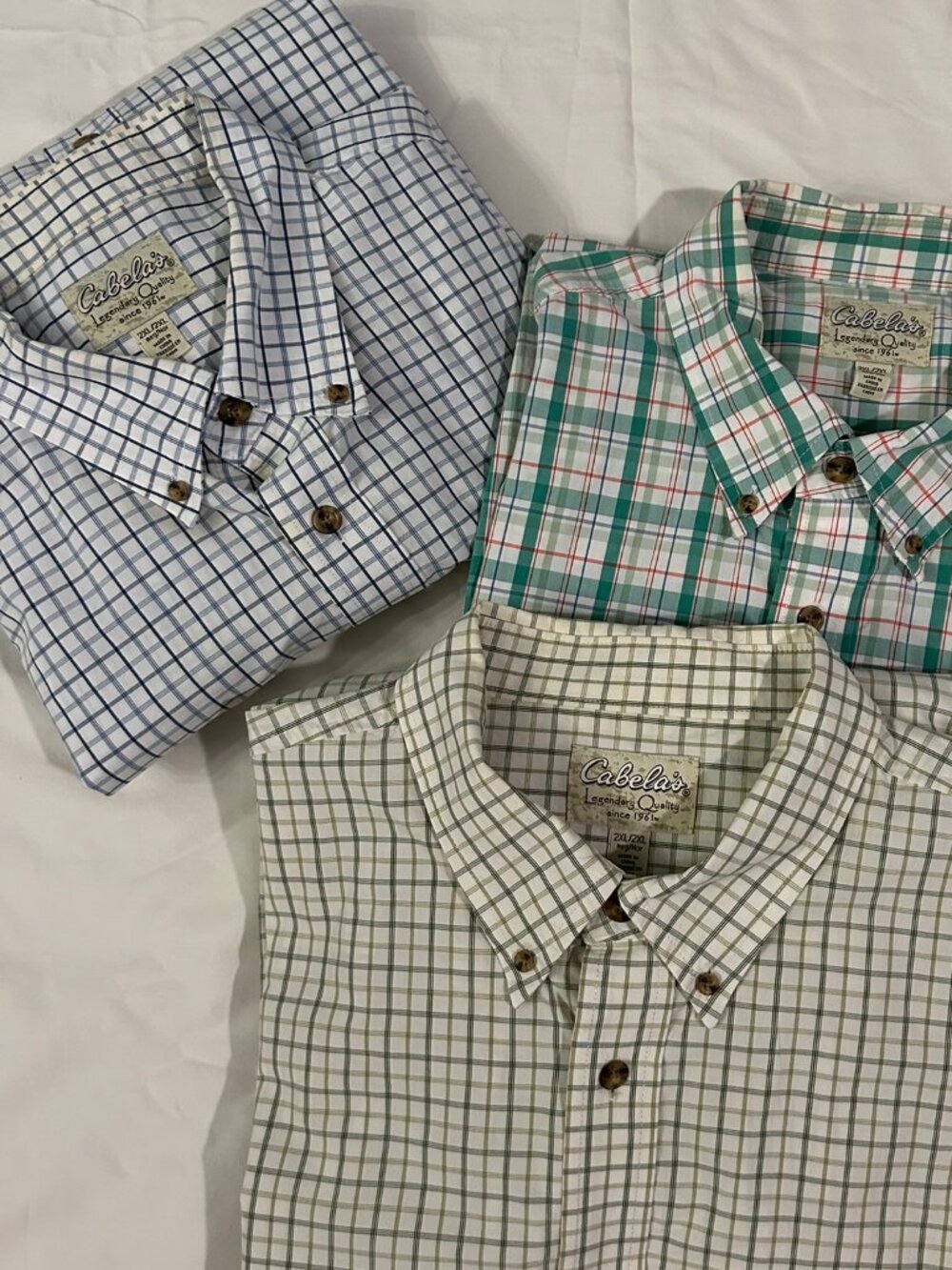 Three men's 100% cotton button down the front shirts